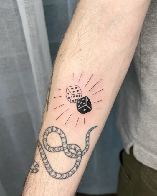 Small Linework Dice and Snake Tattoo on Men Arm by @trevfromdowntheway
