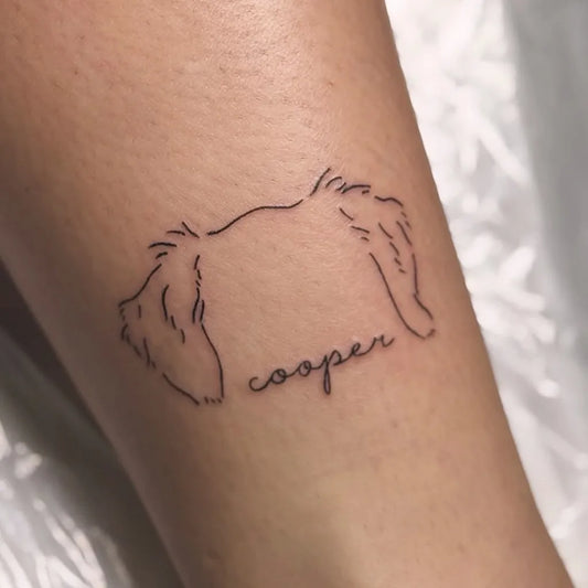 Small Linework Dog Tattoo on Women Arm by @modernzink