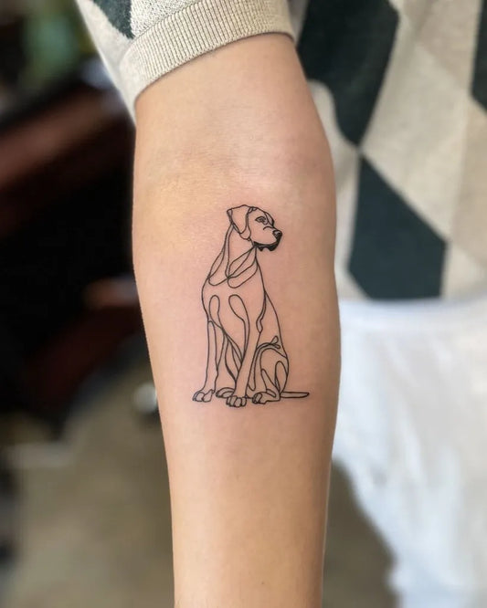 Small Linework Dog Tattoo on Women Arm by @paintedsoularts