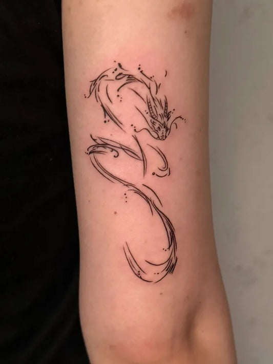 Small Linework Dragon on Women Arm Tattoo by @yeji_tattoo