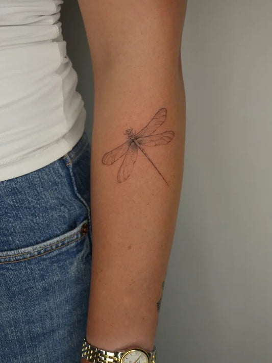 Small Linework Dragonfly on Women Arm Tattoo by @lucascardua