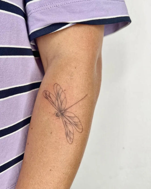Small Linework Dragonfly on Women Arm Tattoo by @tiny.tattoo.lines
