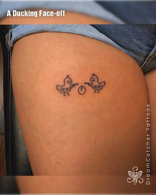 Small Linework Dueling Ducks on Thigh on Women Thigh Tattoo by @dreamcatcher_tattoos
