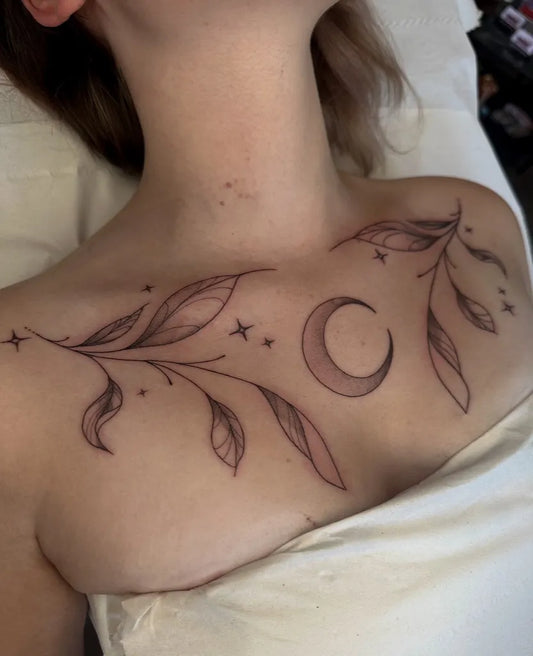 Small Linework Foliage and Crescent Moon on Women Chest Tattoo by @gemineyetattoos