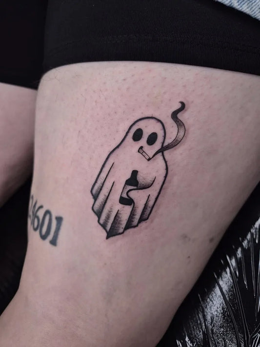 Small Linework Ghost Smoke and Drink Tattoo on Women Thigh by @hauntedhattie