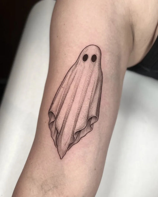 Small Linework Ghost Tattoo on Women Arm by @tyler.tattoos