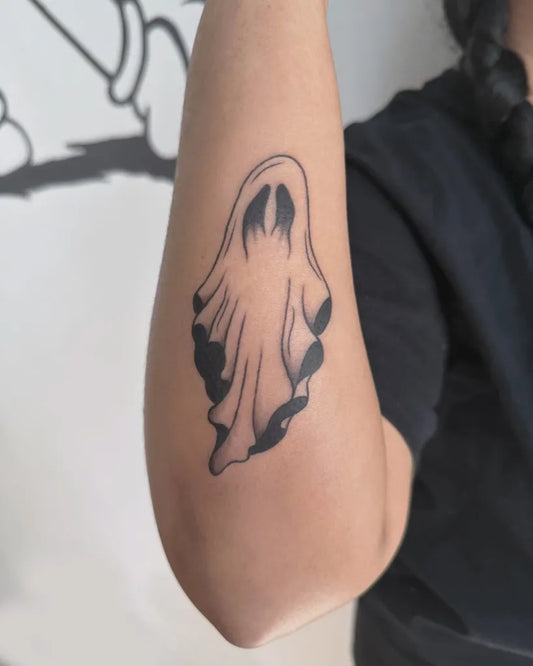 Small Linework Ghost Tattoo on Women Arm by @whiteghoststudio