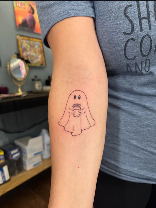 Small Linework Ghost with Cup Tattoo on Women Arm by @rachels_ink_and_things