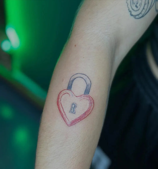 Small Linework Heart Lock on Women Arm Tattoo by @tattoo.anja