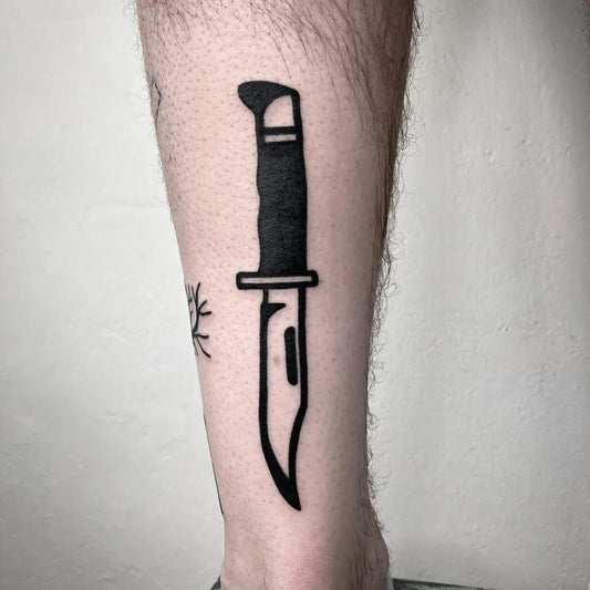 Small Linework Knife Tattoo on Men Leg by @mknxbasei