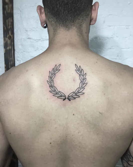 Small Linework Laurel Wreath Tattoo on Men Back by @inkstain_ty