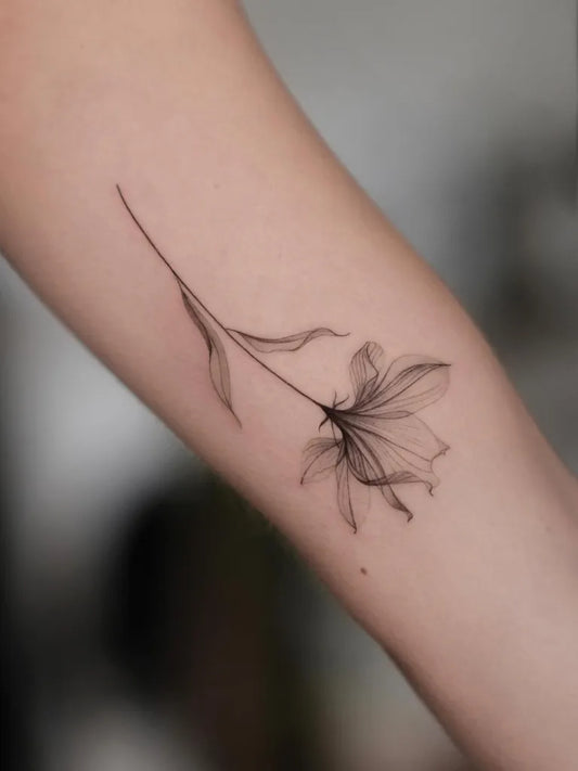Small Linework Lily Flower on Women Arm Tattoo by @astree__