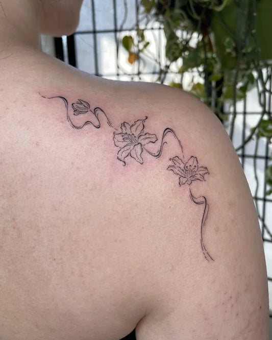 Small Linework Lily Vine on Women Shoulder Flower Tattoo by @444hanh
