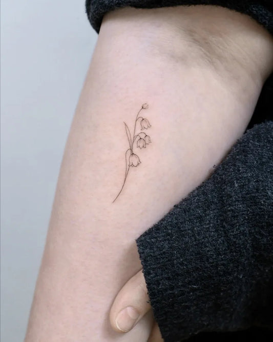 Small Linework Lily of the Valley Women Arm Tattoo by @tattooist_mora
