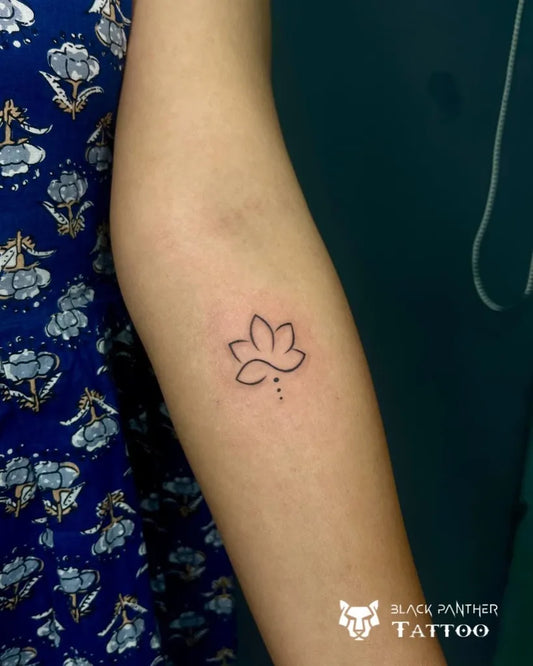 Small Linework Lotus Flower on Women Arm Tattoo by @_blackpanther_tattoo_