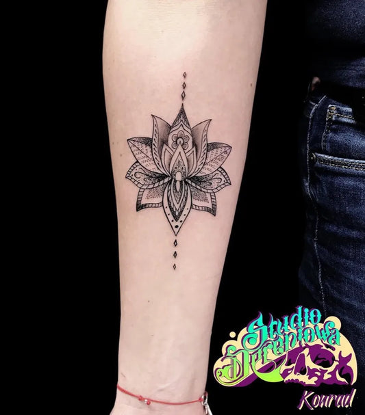 Small Linework Lotus Flower on Women Arm Tattoo by @mandalas_art_tattoo