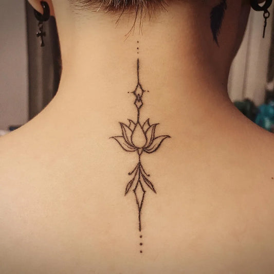 Small Linework Lotus Flower on Women Back Tattoo by @justabitmorbid