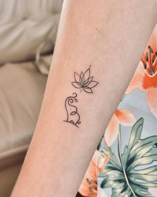 Small Linework Lotus and Elephant Tattoo on Women Arm by @bnanatattoo