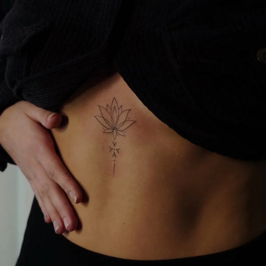 Small Linework Lotus on Women Sternum Tattoo by @bdenn97