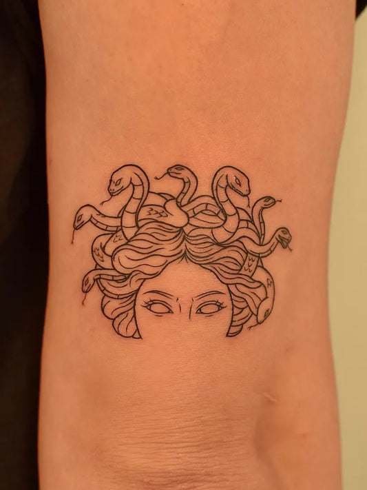 Small Linework Medusa on Women Arm Tattoo by @tattooer_jina