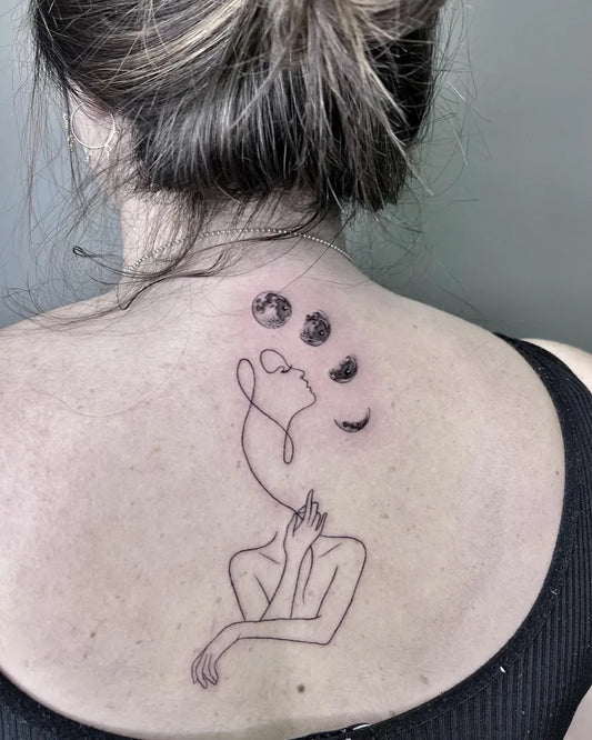 Small Linework Moon Phases Woman Back Tattoo on Women by @fabbr.art_tattoo