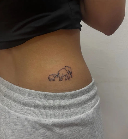 Small Linework Mother and Baby Elephant Tattoo on Women Hip by @ateddybear_art