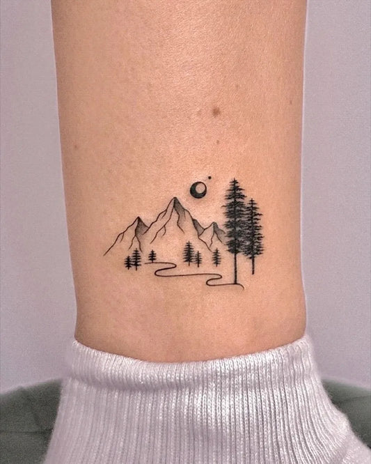 Small Linework Mountains Trees Moon Nature Tattoo on Women Ankle by @bihwa_tt