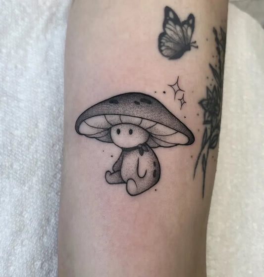 Small Linework Mushroom and Butterfly on Women Arm Tattoo by @tattoothyme