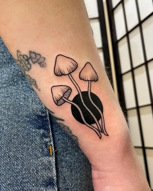 Small Linework Mushrooms on Women Arm Tattoo by @caravanessa.tattoo