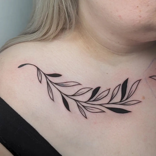 Small Linework Olive Branch Tattoo on Women Collarbone by @rodrigops_tattoos
