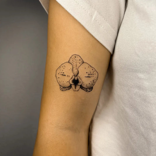 Small Linework Orchid Tattoo on Women Arm by @workkslalei
