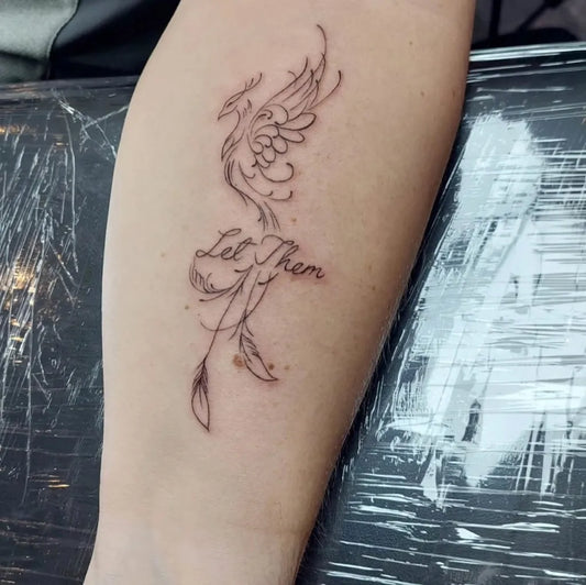 Small Linework Phoenix Let Them on Women Forearm Tattoo by @creasnatertje