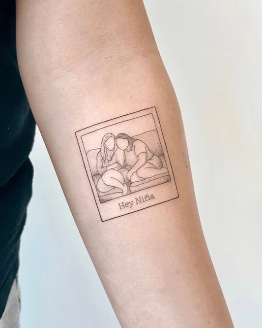 Small Linework Polaroidwithcuddlingcouple on Women Arm Tattoo by @cha.tattoo