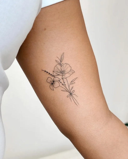 Small Linework Poppies and Leaves on Women Arm Tattoo by @cha.tattoo