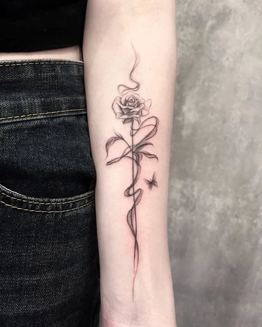 Small Linework Rose and Butterfly on Women Arm Tattoo by @tattoo_kyra