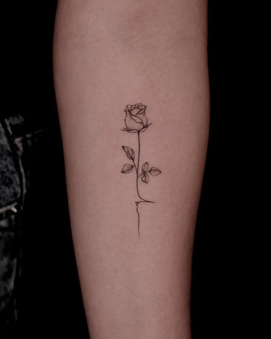 Small Linework Rose on Women Arm Tattoo by @isoltattoo