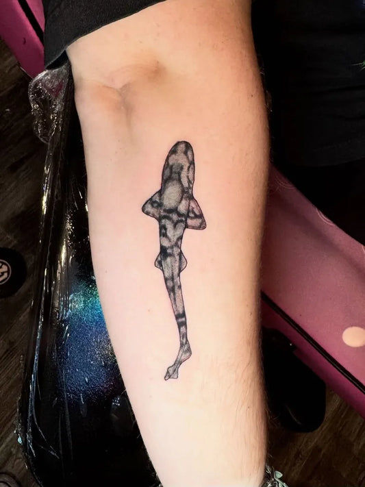 Small Linework Shark Human on Women Forearm Tattoo by @boston.born.ink