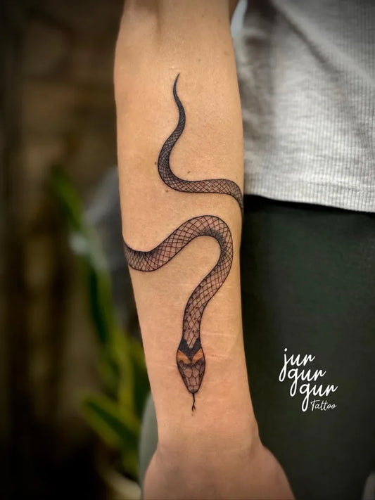 Small Linework Snake on Men Arm Tattoo by @jurgurgur