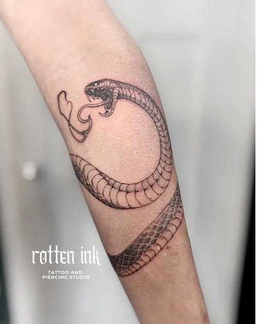 Small Linework Snake on Women Forearm Tattoo by @briandang.tattoo