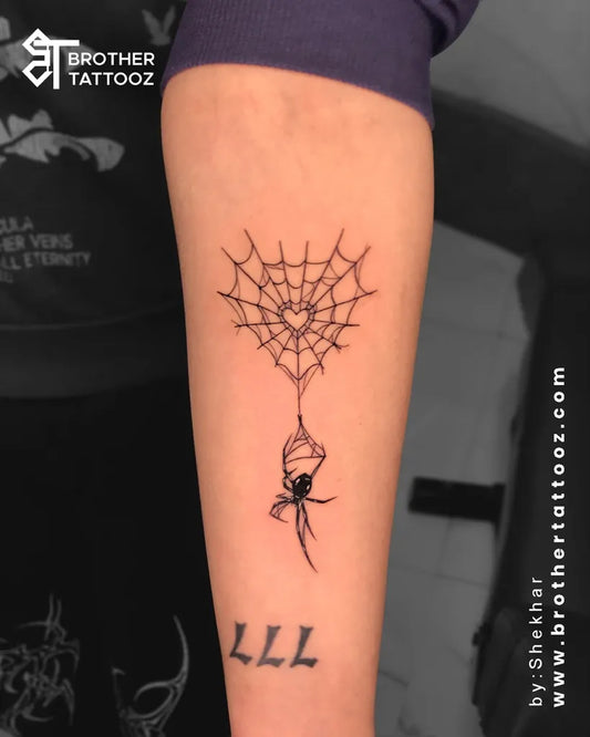 Small Linework Spider Web and Spider on Women Arm Tattoo by @brothertattooz