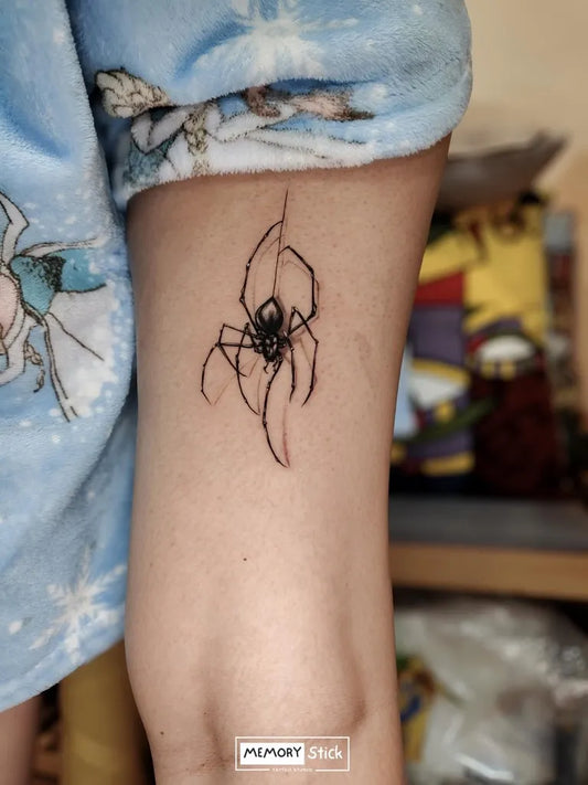 Small Linework Spider on Women Arm Tattoo by @memorystick.tattoo