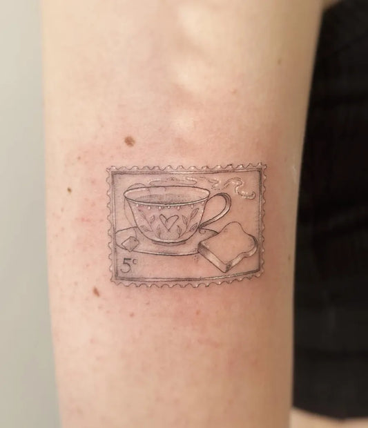 Small Linework Stamp with Teacup and Toast on Women Arm Tattoo by @lish.tattoos
