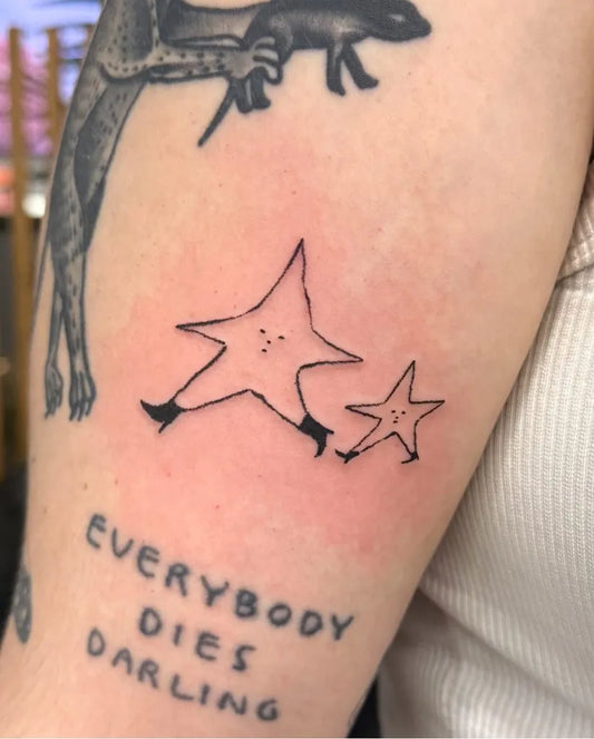 Small Linework Star with Heels Tattoo on Women Arm by @banban_tattooer