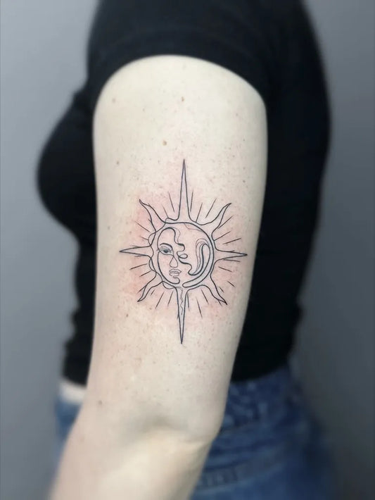 Small Linework Sun and Face on Women Arm Tattoo by @finelinetattooslondon