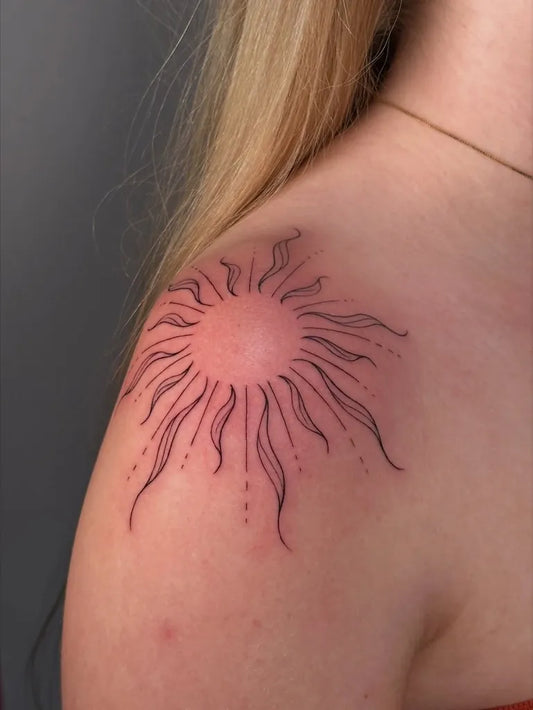 Small Linework Sun on Women Shoulder Tattoo by @loverseyetattoo