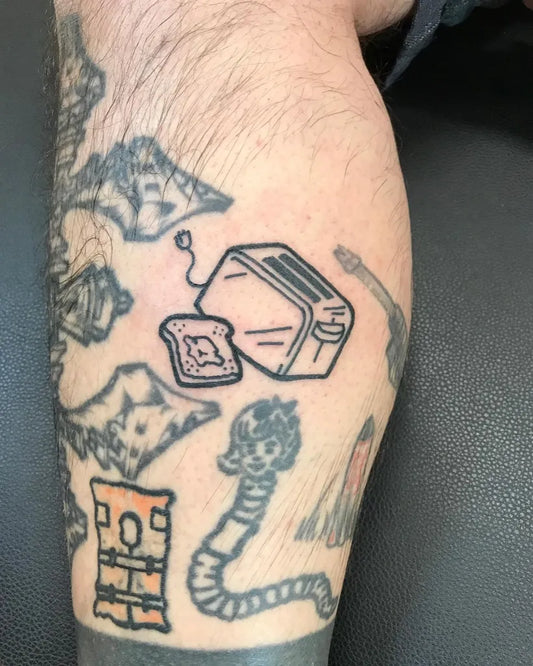 Small Linework Toast Toaster Worm on Men Leg Tattoo by @sarahericeart