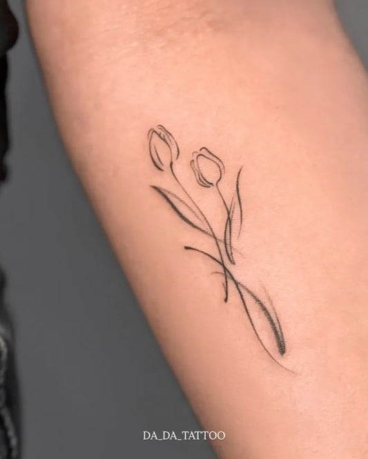 Small Linework Two Tulips Tattoo on Women Arm by @da_da_tattoo