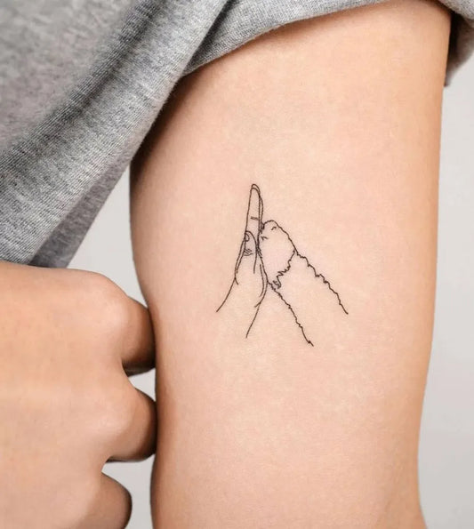 Small Linework TwoInterlockedHands on Women Thigh Tattoo by @small.tattoos
