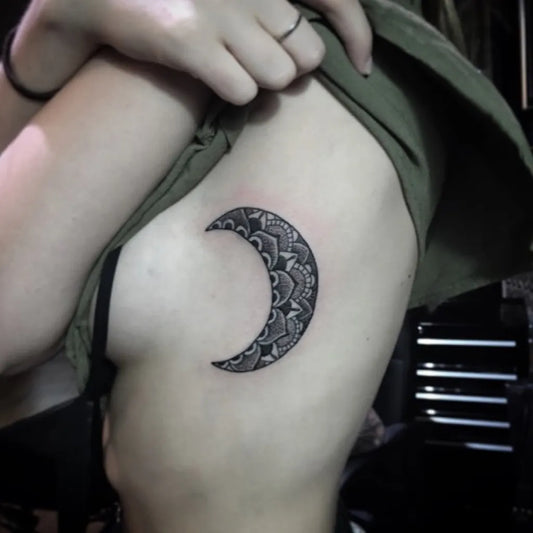 Small Mandala Crescent Moon Tattoo on Women Rib by @383tattoogc