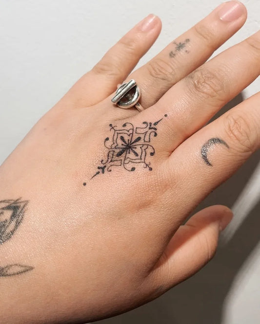 Small Mandala Crescent on Women Fingers Tattoo by @kosari_tattoo